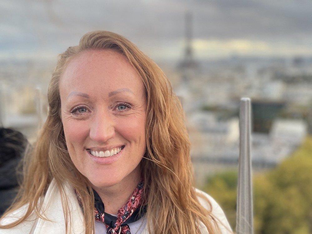 Kelly in Paris with the Eiffel Tower
